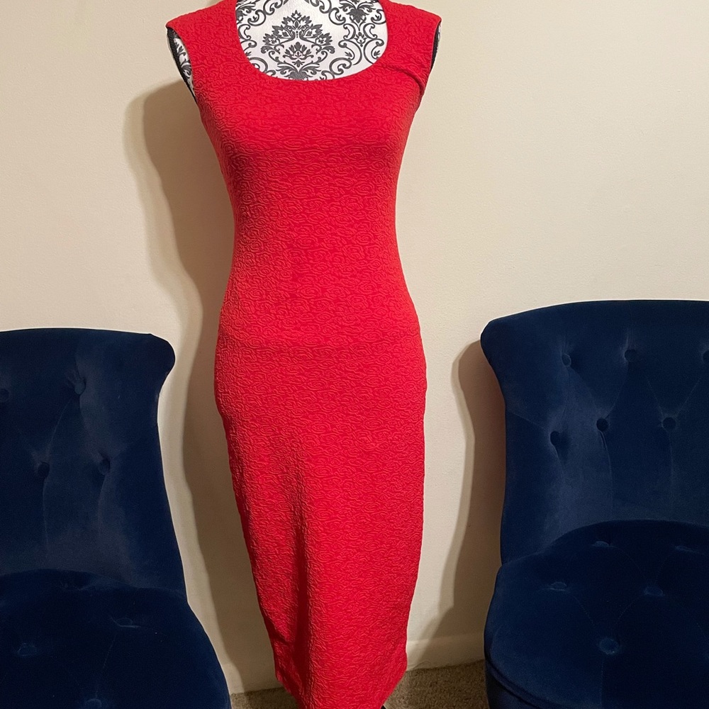 Beautiful red pencil dress that hugs all of your curves.